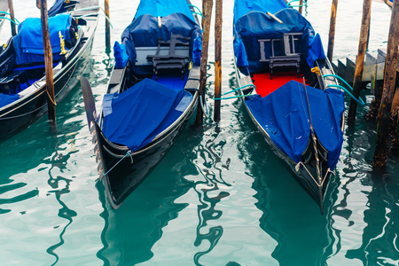 Rows of traditional wooden gondolasの写真素材