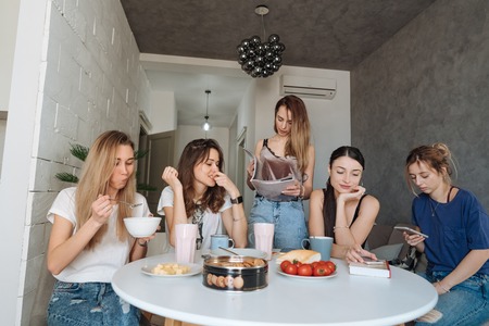 group of women in the kitchenの写真素材