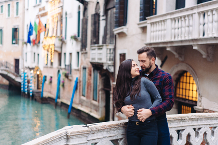 Loving couple on the one of bridgeの写真素材