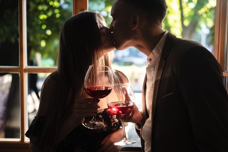 Young couple by the window