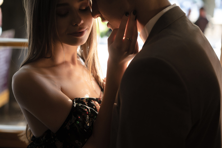 Young couple posing at the cameraの写真素材