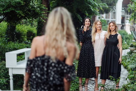 Girlfriends are photographed in the park