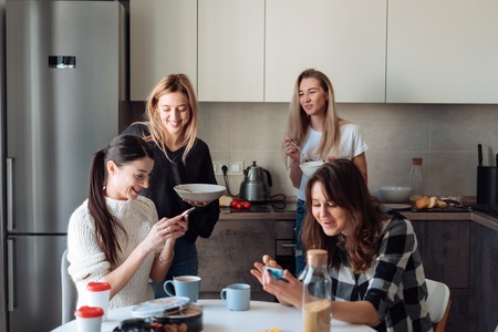 group of women in the kitchenの写真素材
