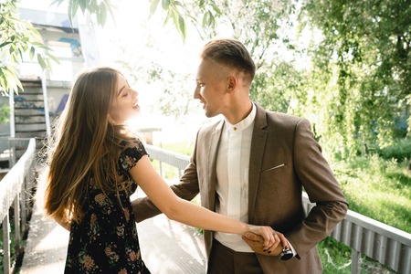 A pair of lovers posing on the camera.