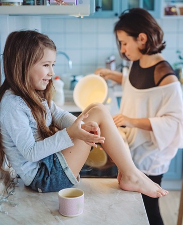 happy family cook together in the kitchenの写真素材