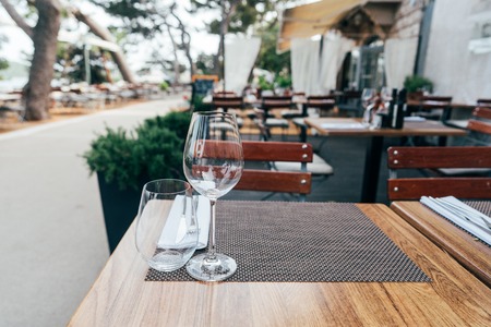 Two glasses on the table. Street summer cafeの写真素材