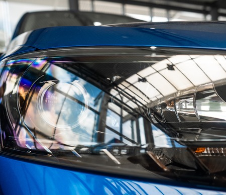 The headlamp of a modern prestigious car from a close angleの写真素材