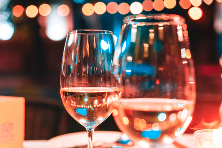 photo of two champagner glasses on tableの写真素材