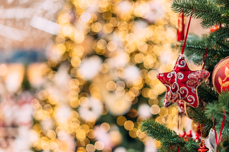 close up view of decorative toys on christmas treeの写真素材