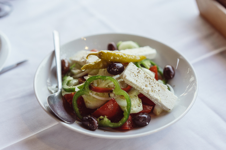 On the plate is a Greek salad.の写真素材