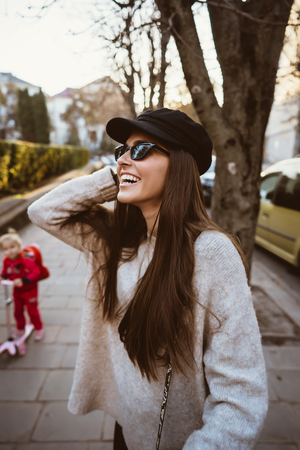 Street portrait of young beautiful fashionable womanの写真素材