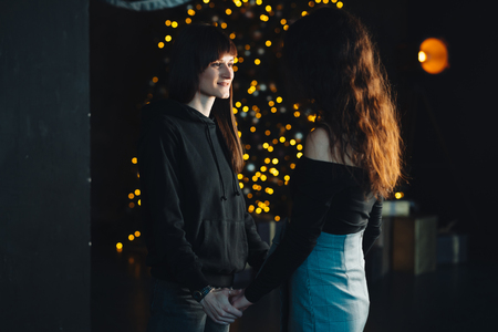 Two girls dancing on camera in the studioの写真素材