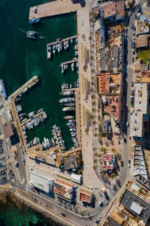 Beautiful turquoise bay at Formentera, aerial view. Snow-white yachts near the coast.の写真素材