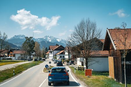 Car driving on the highway with mountainsの写真素材