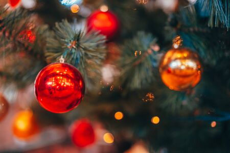 Close-up of Christmas tree branches with decorations