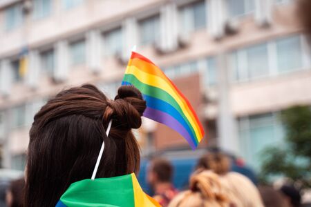 Photo of a girl with braided lgbt flag in her hairの写真素材