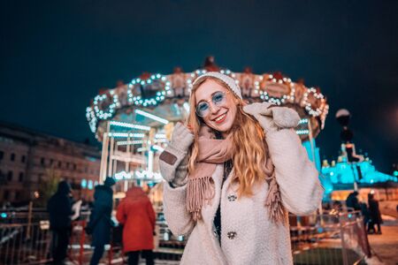 Front view girl on defocus background bokeh light in evening streetの写真素材