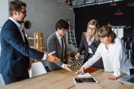 Business people having discussion, dispute or disagreement at meeting or negotiationsの写真素材