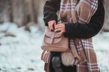 Young beautiful model posing in winter forestの写真素材