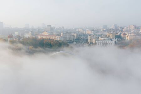 Aerial view of the city in the fogの写真素材