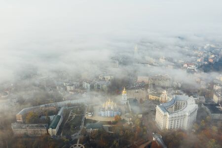 Aerial view of the city in the fogの写真素材