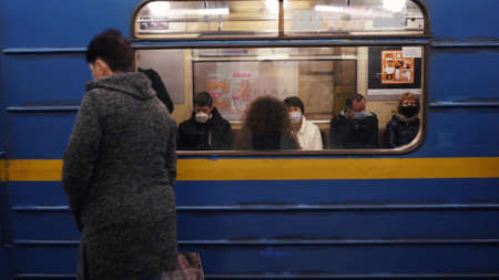 UKRAINE, KIEV - MAY 26, 2020: subway station. People in a subway carのeditorial素材