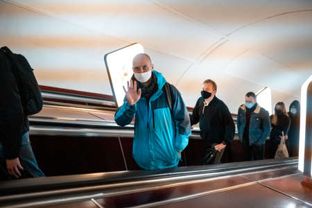 UKRAINE, KIEV - MAY 26, 2020: subway station Zoloty Vorota (Golden Gate). People go on the escalator in the metro.のeditorial素材