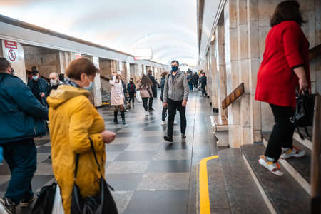 UKRAINE, KIEV - MAY 26, 2020: subway station Zoloty Vorota (Golden Gate). People enter the train car at the metro station.のeditorial素材