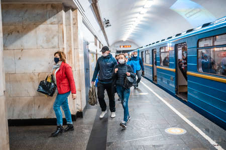 UKRAINE, KIEV - MAY 26, 2020: subway station Zoloty Vorota (Golden Gate). People enter the train car at the metro station.のeditorial素材