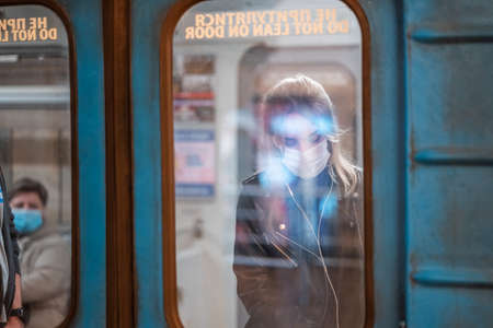 UKRAINE, KIEV - MAY 26, 2020: subway station Zoloty Vorota (Golden Gate). People in a subway carのeditorial素材