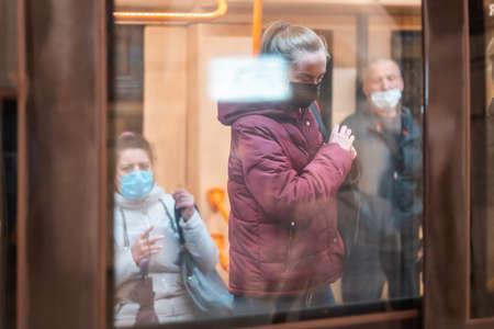 UKRAINE, KIEV - MAY 26, 2020: subway station Zoloty Vorota (Golden Gate). People in a subway car