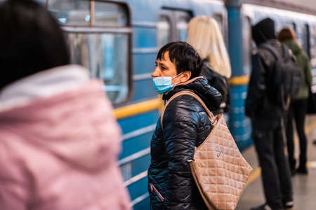 UKRAINE, KIEV - MAY 26, 2020: subway station Zoloty Vorota (Golden Gate). People enter the train car...