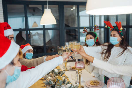 Multi-ethnic young people celebrating New year eve at partyの写真素材