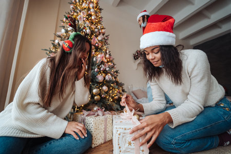 Beautiful girl exchange gifts for the new year.の写真素材
