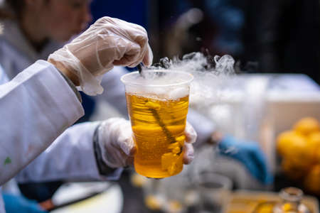 Multicolored alcoholic and non-alcoholic cocktails with strawsの写真素材