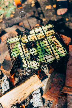 Grilled zucchini on grill