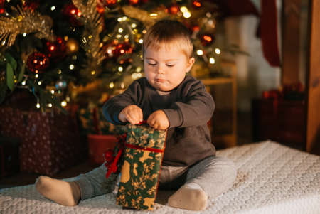 A little boy in a beautiful New Years photo studio.の写真素材