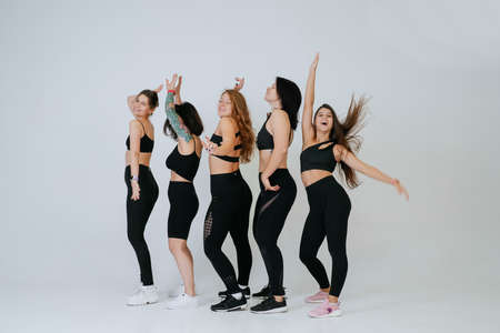 diverse models laughing, enjoying time together, look at cameraの写真素材