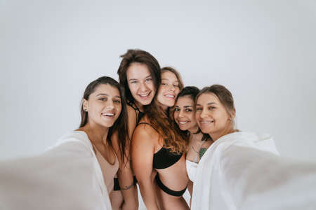 Diverse models wearing comfortable underwear take selfieの写真素材