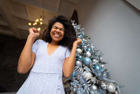 Nice attractive lovely overjoyed woman looks at the cameraの写真素材