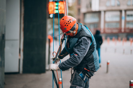 Worker climber preparing for work at height.の写真素材