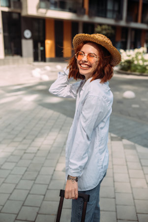 A red-haired woman poses for the cameraの写真素材
