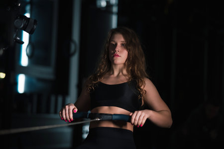 Athletic Beautiful Woman Does her cross fitness at gymの写真素材