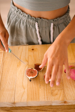 Preparing Fresh Fig for an Exciting Culinary Delight in the Kitchen with Creativityの写真素材