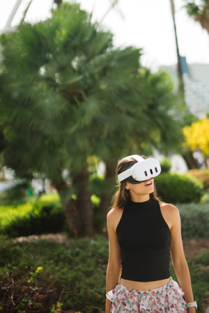 A Young Woman Enjoying the Experience of Virtual Reality While Being Outdoors in Nature
