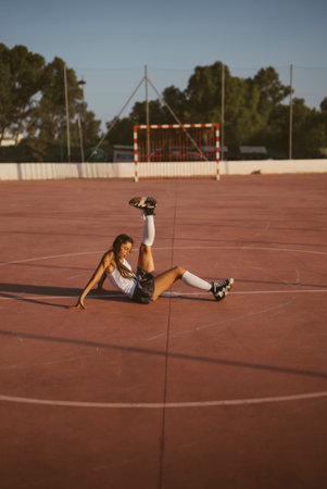 A Dynamic Sports Pose Captured on the Court, Showcasing the Athletes Energy and Determinationの写真素材