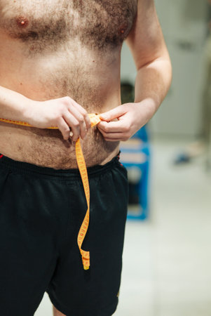 Measuring Waist Size Accurately for Achieving Your Health and Fitness Goals Effectivelyの写真素材