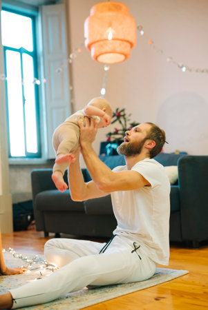 A Joyful and Heartwarming Interaction Between Parent and Baby in A Cozy and Comfortable Setting