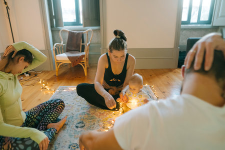 Join our Meditative Group Session with a Baby in nature to enhance mindfulness and wellbeingの写真素材