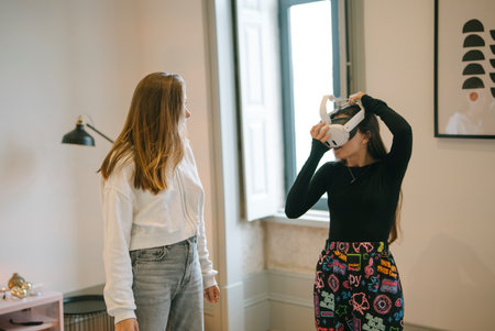 People Engaging with CuttingEdge Virtual Reality Technology in Contemporary Interior Spacesの写真素材